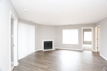Open concept living spaces, with large windows and ample sunlight